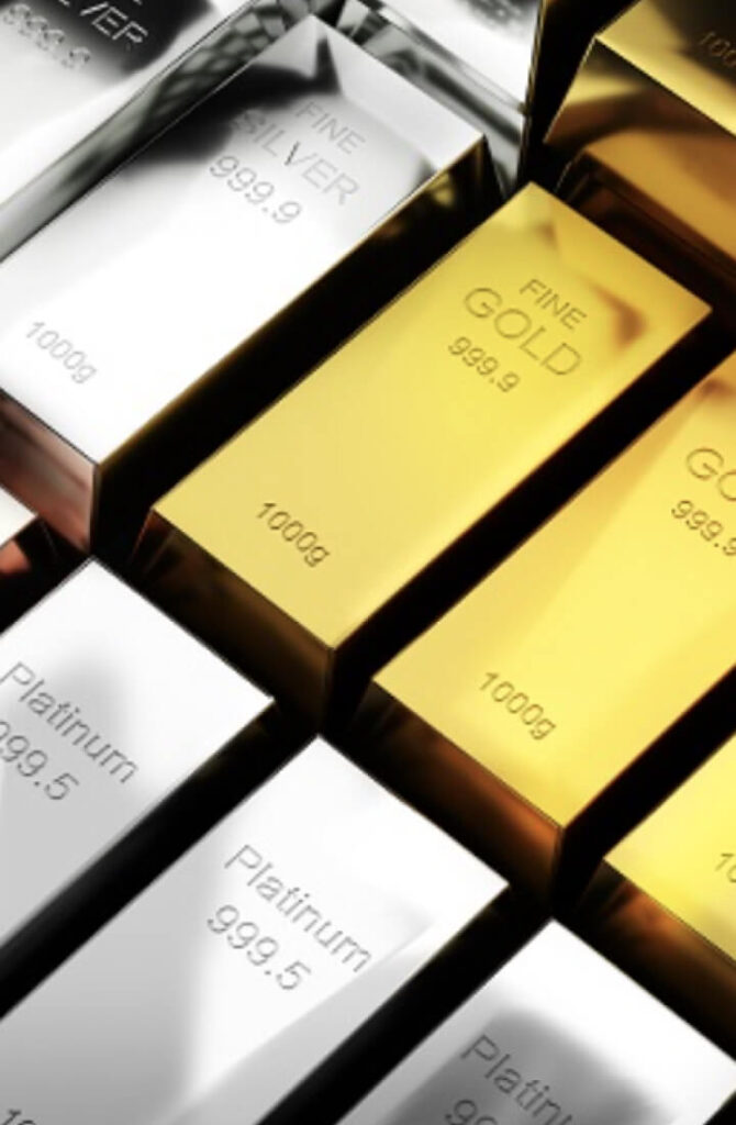 Gold und Silberbarren nebeneinander.